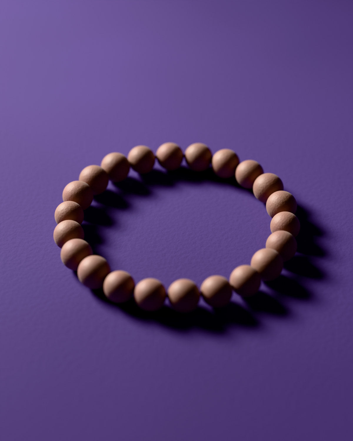 The Elegant Orchid & Ambergris bracelet with 8 mm beads, a 3D rendering
