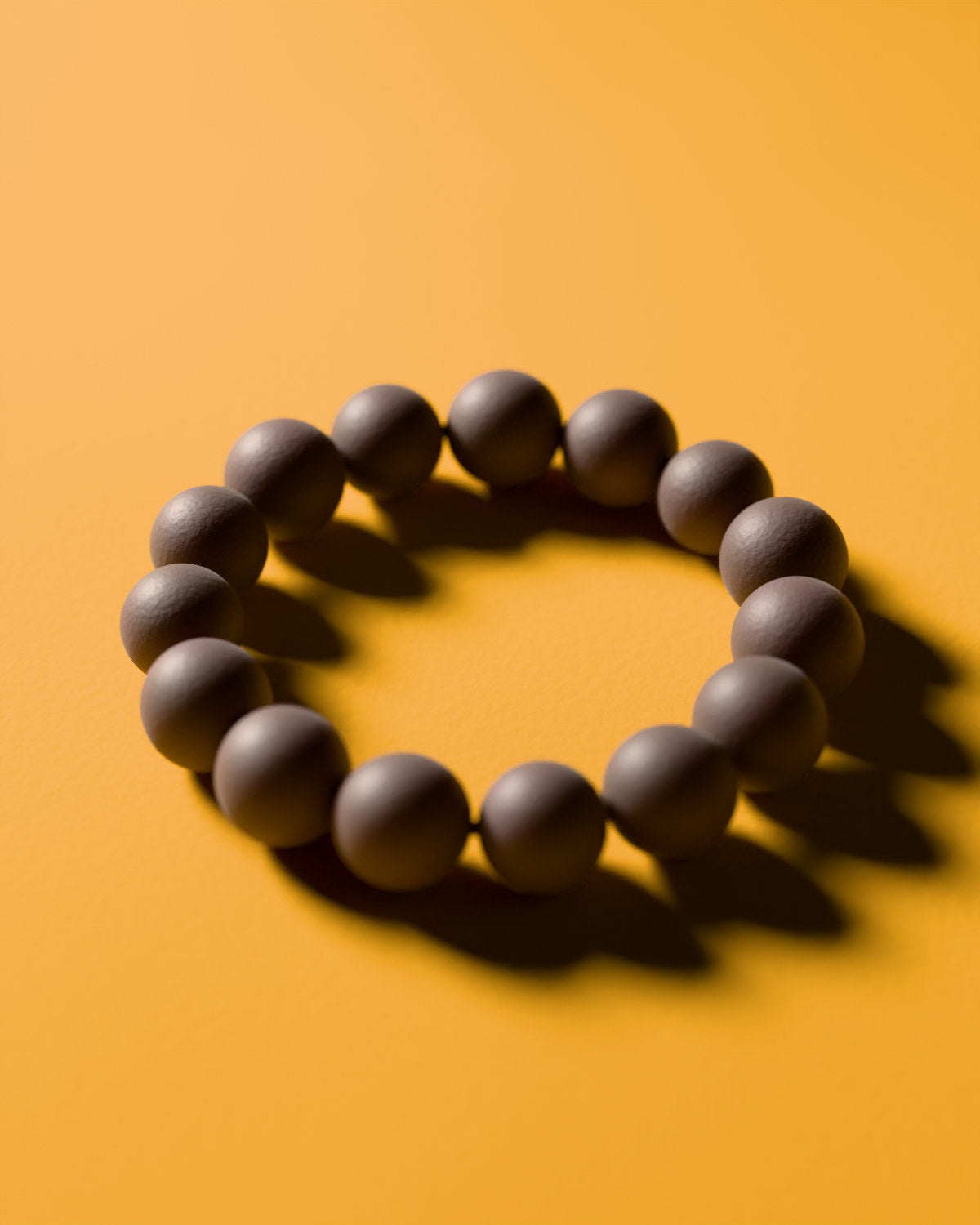 The Moonlit Osmanthus bracelet with 12 mm beads, a 3D rendering